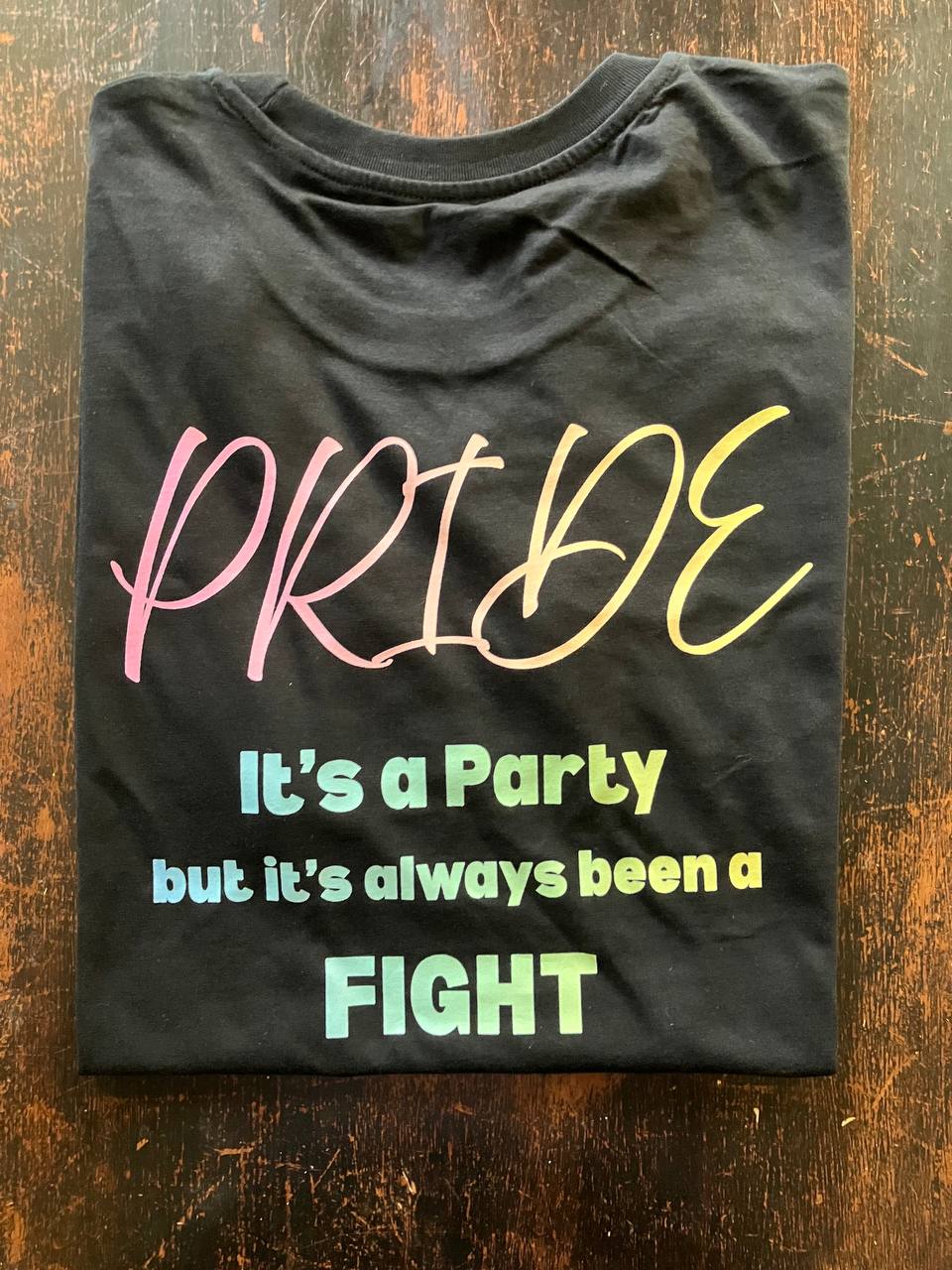 Pride T-shirt English side — It's a Party but it's always been a Fight